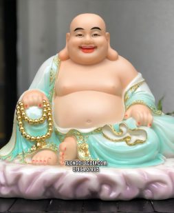 Tượng Phật Di Lặc áo xanh viền vàng ngồi bệ đá